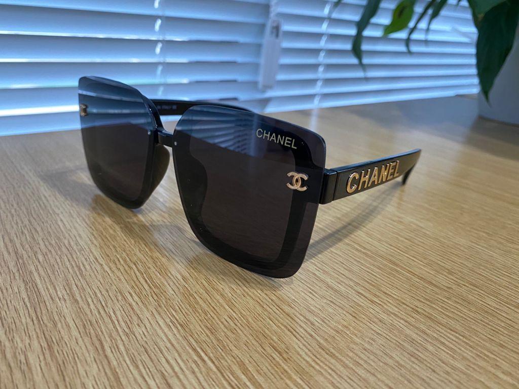 A black Chanel sunglasses
