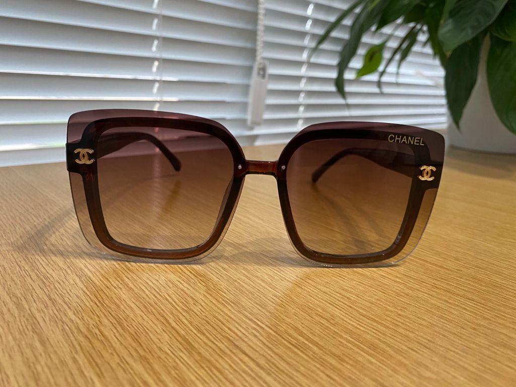 A brown Chanel sunglasses