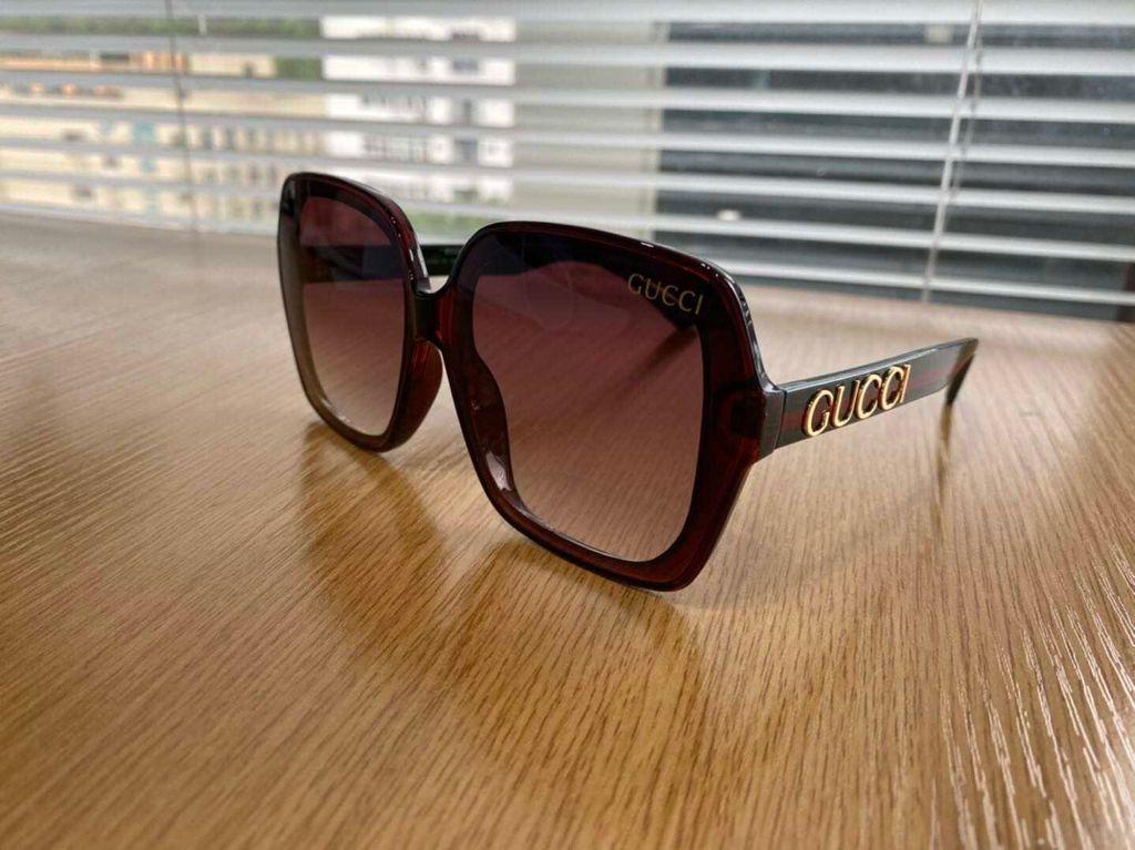 A brown Gucci sunglasses